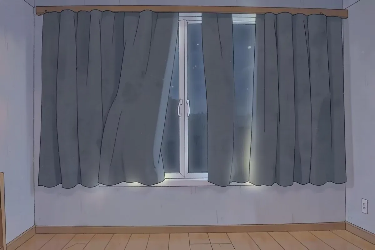 Dark curtains drawn across a bedroom window with light glowing around the edges